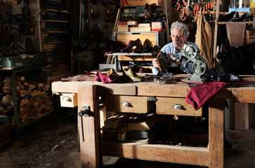 craftsman making luxury handmade man shoes