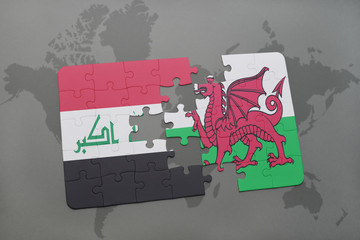 puzzle with the national flag of iraq and wales on a world map background.