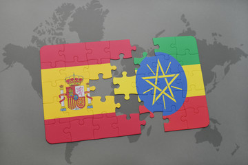 puzzle with the national flag of spain and ethiopia on a world map background.