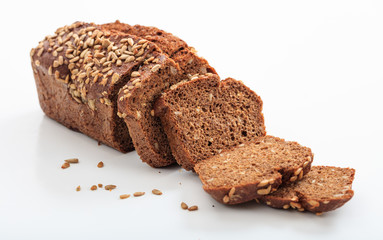 Whole wheat bread on white background