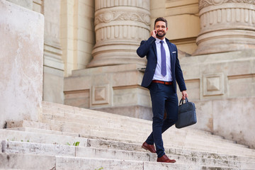 Young businessman on the stairs    