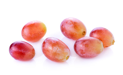 red seedless grapes isolated on white background