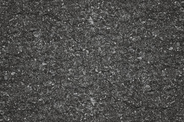 Asphalt background texture with some fine grain in it background