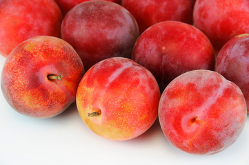 fresh plum isolated on white background