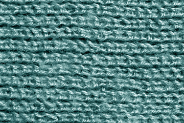 Wool knitting cyan pattern.