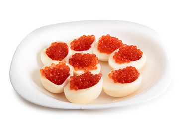 Fish caviar in a plate on a white background
