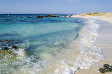 Elafonisi beach in Crete island, Greece, wonderful mediterranean beach with turquoise waters and pink sand