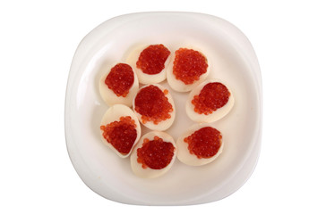 Fish caviar in a plate on a white background