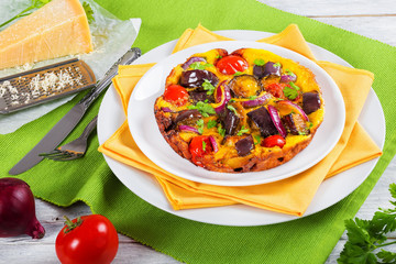 oven baked tasty frittata with vegetables, close-up