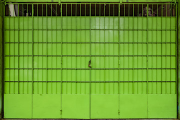 Green metal gate, Yangon, Myanmar