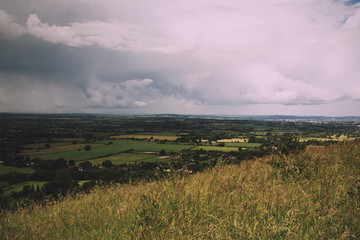 Fototapeta premium Cloudy view over the Chilterns in Buckinghamshire Vintage Retro