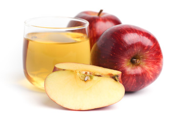 Red apple and juice on white background