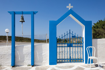 Bell and gate of church in Kos island, Greece
