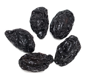 Prunes on a white background