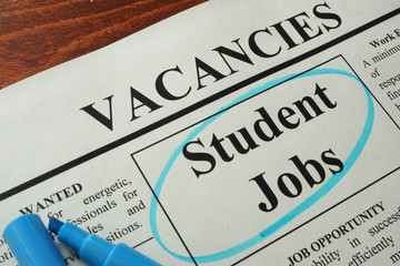 Newspaper with ads student jobs vacancy. Occupation concept.