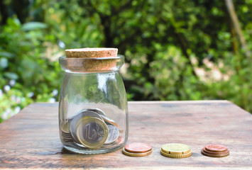  money (coins) - savings and investment concept
