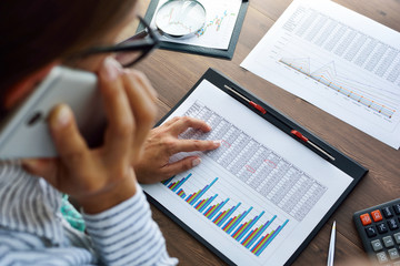 Businesswoman examine finance