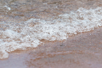 Fototapeta na wymiar Sand under water as a background