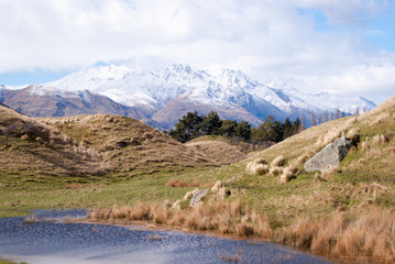 Fototapeta na wymiar Snow covered mountains at Routeburn Track, New Zealand