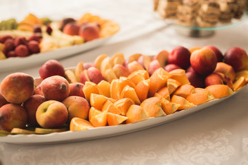 Different fresh fruits on wedding buffet table