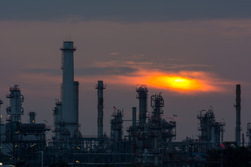 Fototapeta premium Oil and gas refinery at twilight - Petrochemical factory