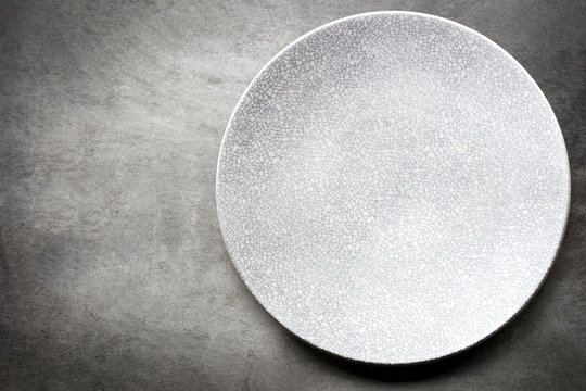 Empty Plate over Slate Top View