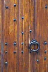 part of thick very old wooden door of church or medieval buildin
