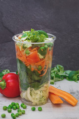 Vegetable salad in take away clear plastic cup 