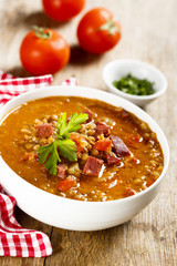 Tomato soup with lentils and sausages
