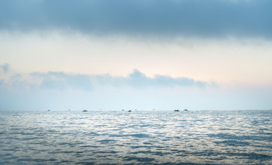 Obraz premium Fishermen at sunrise