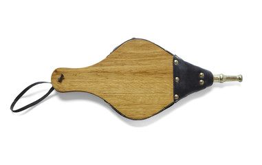 A set of old fashioned fire bellows isolated on a white background