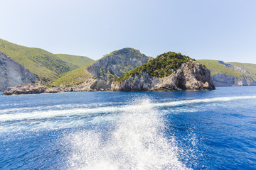Cruise around Zakynthos, views from the sea on the island, Greece, background.