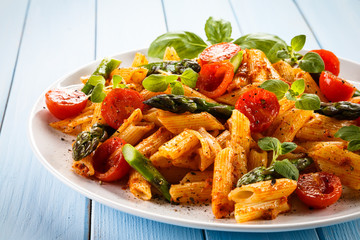 Pasta with meat, tomato sauce and vegetables