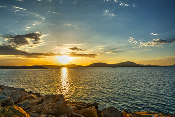 colorful sunset in Alghero harbor