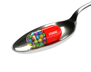 3d rendering of vitamin pill with granules on spoon