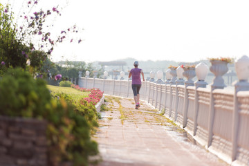 Fototapeta na wymiar sporty woman jogging