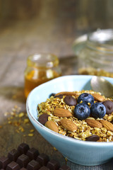 Granola with chocolate and almond - healthy breakfast concept.