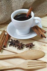 Glass of hot cinamon espresso with