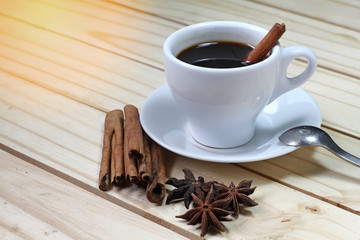 Glass of hot cinamon espresso with