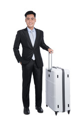 Asian business traveler pulling suitcase and holding passport an