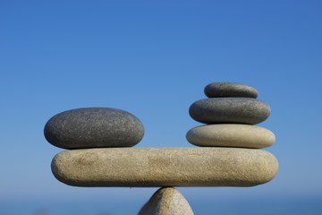 Fototapeta na wymiar Balance of stones: a combination of pros and cons.