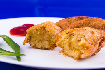 Indian food - vegetarian  bread roll with stuffed potatoes