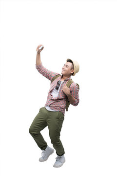 Portrait Of Smiling Asian Man Taking Selfie On White Background