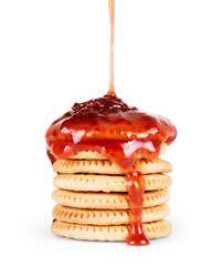 cookies pouring topping on a white background