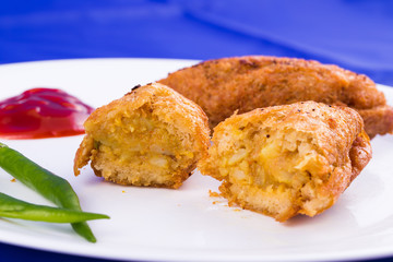 Indian food - vegetarian  bread roll with stuffed potatoes