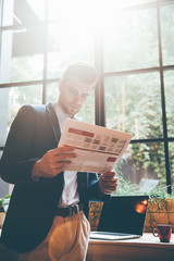 Man reading newspaper. 