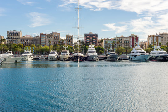 Luxury yachts moored in the marina Port Vell in Barcelona. The city is an important destination. Some yachts are rentable for incredible money