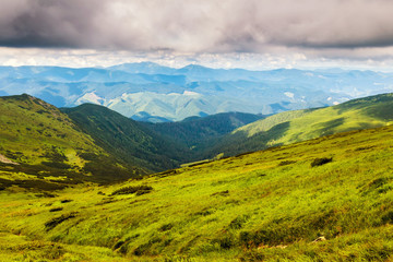 Picturesque Carpathian mountains landscape in summer, view from the height, Ukraine.