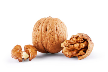 walnut and a cracked walnut isolated on the white background