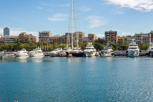 Luxury yachts moored in the marina Port Vell in Barcelona. The city is an important destination. Some yachts are rentable for incredible money